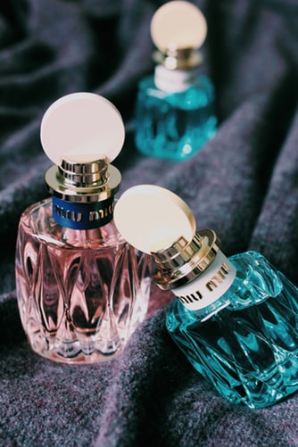 three perfume bottles