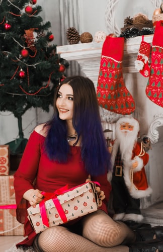 woman holding holiday box