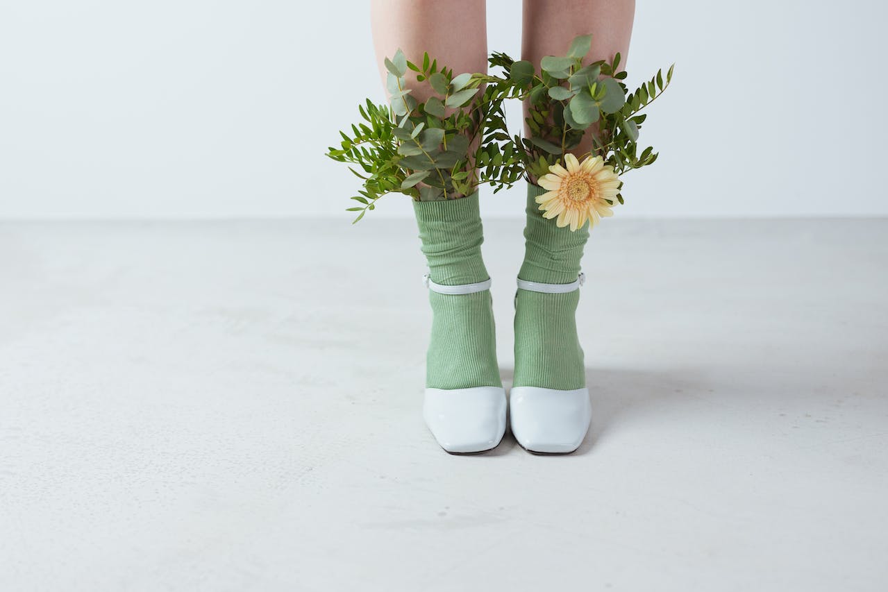 Leaves and a Flower on a Person&#039;s Socks