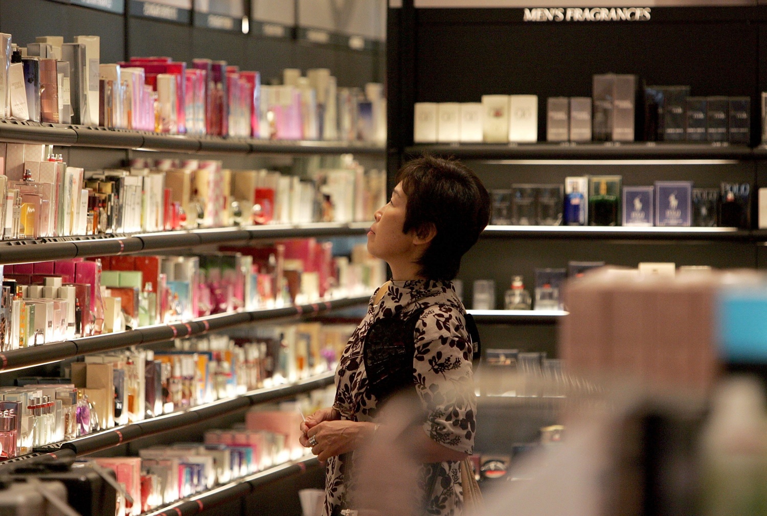 U.S. Raises Air Security Alert to Red -  An woman browses through perfume at a Sephora cosmetics store