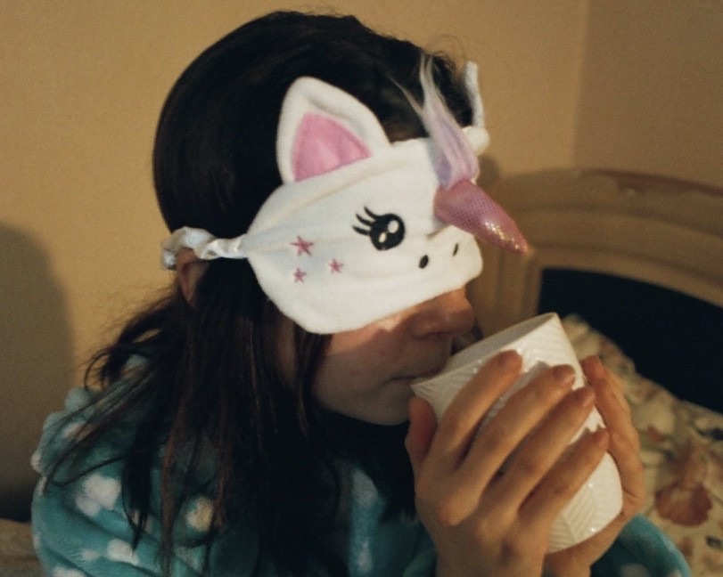 girl wearing eye mask