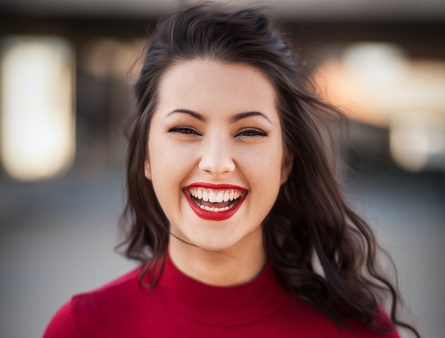 girl in red smiling