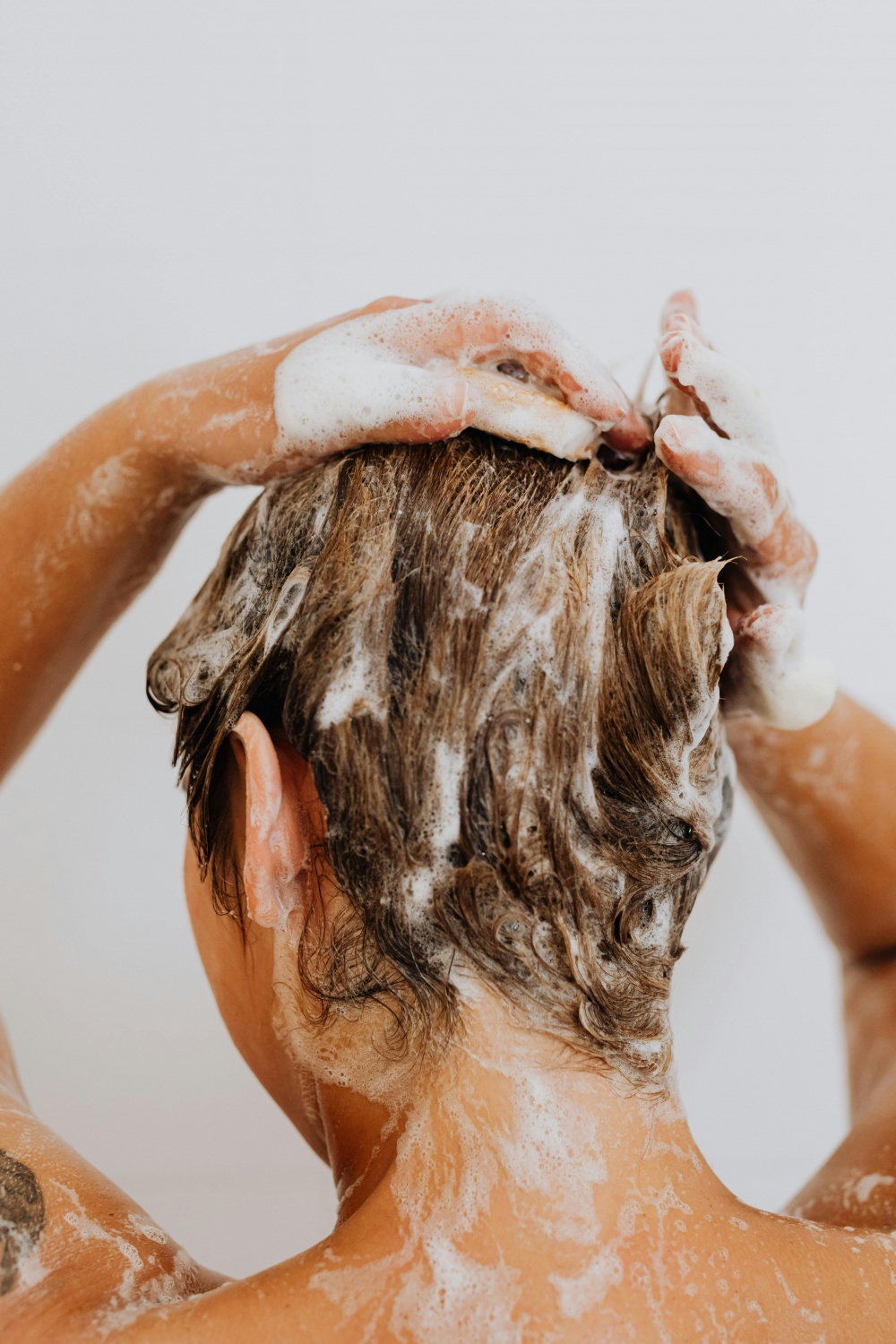 woman washing hair 