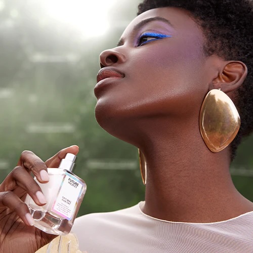 Black model spraying perfume primer 