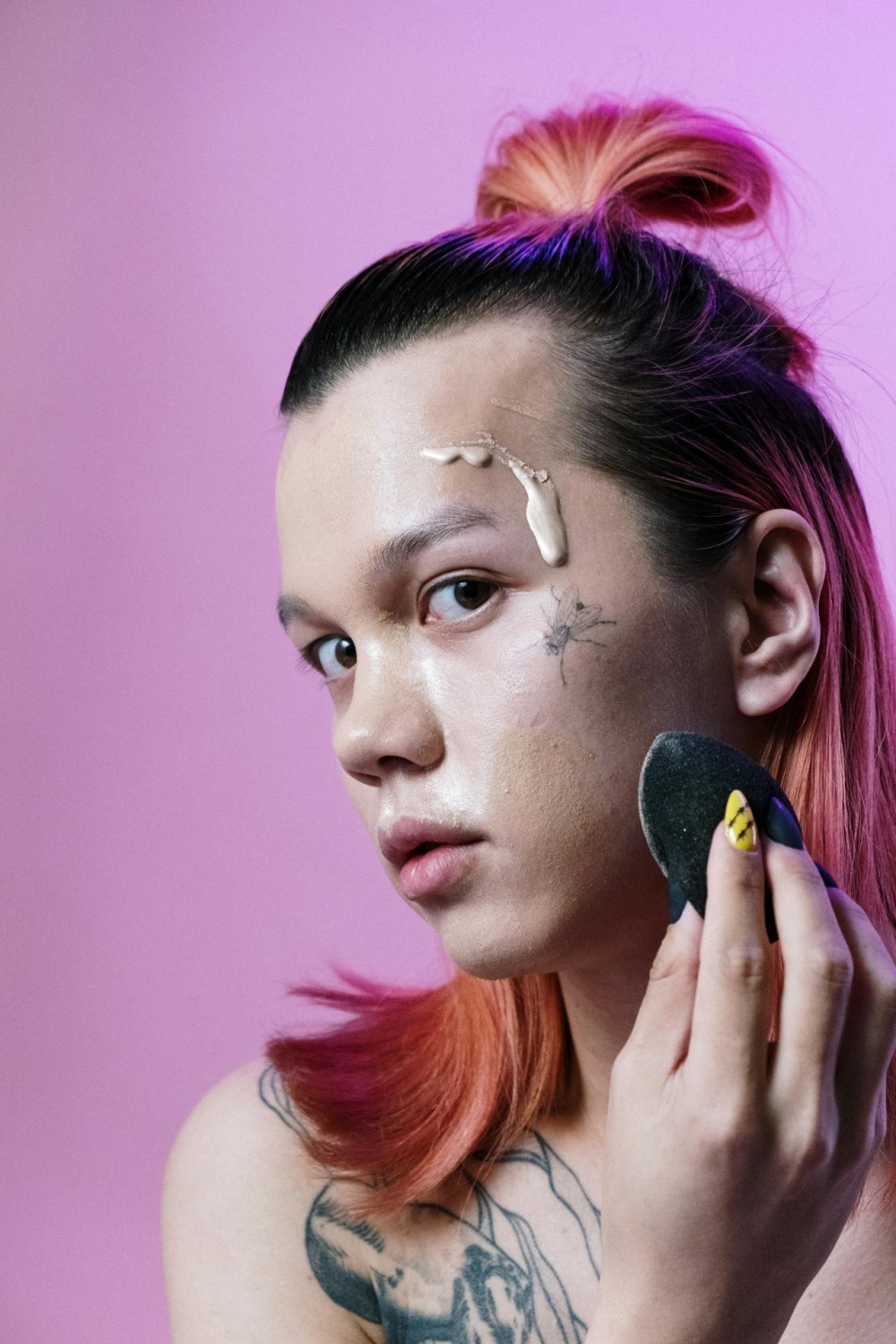 Hide Tattoos with These Full Coverage Concealers