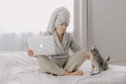 Girl with laptop and cat
